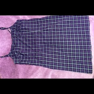 Cute green dress with stripes over lapped. Opened from the back.